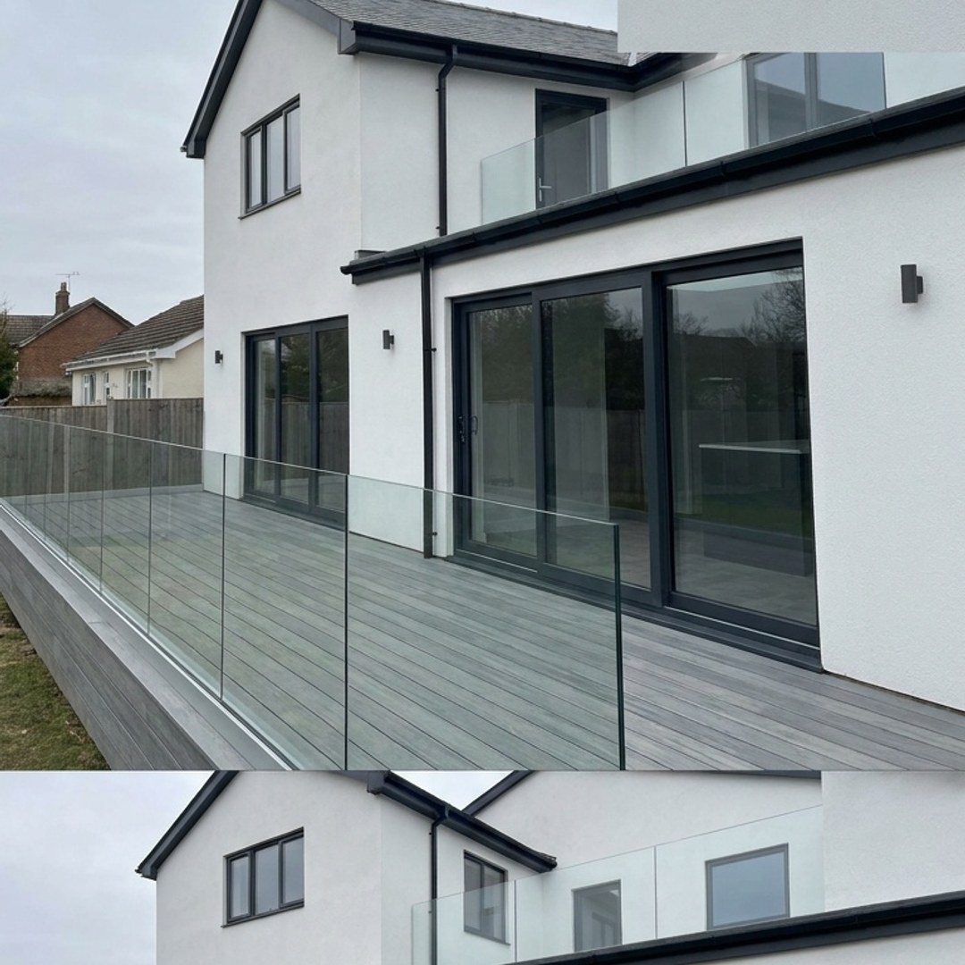 Grey composite decking with glass balustrade