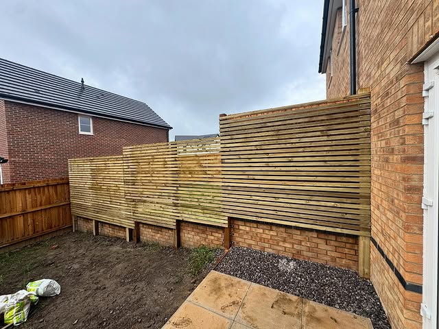 Slatted timber screen fencing, new-build garden